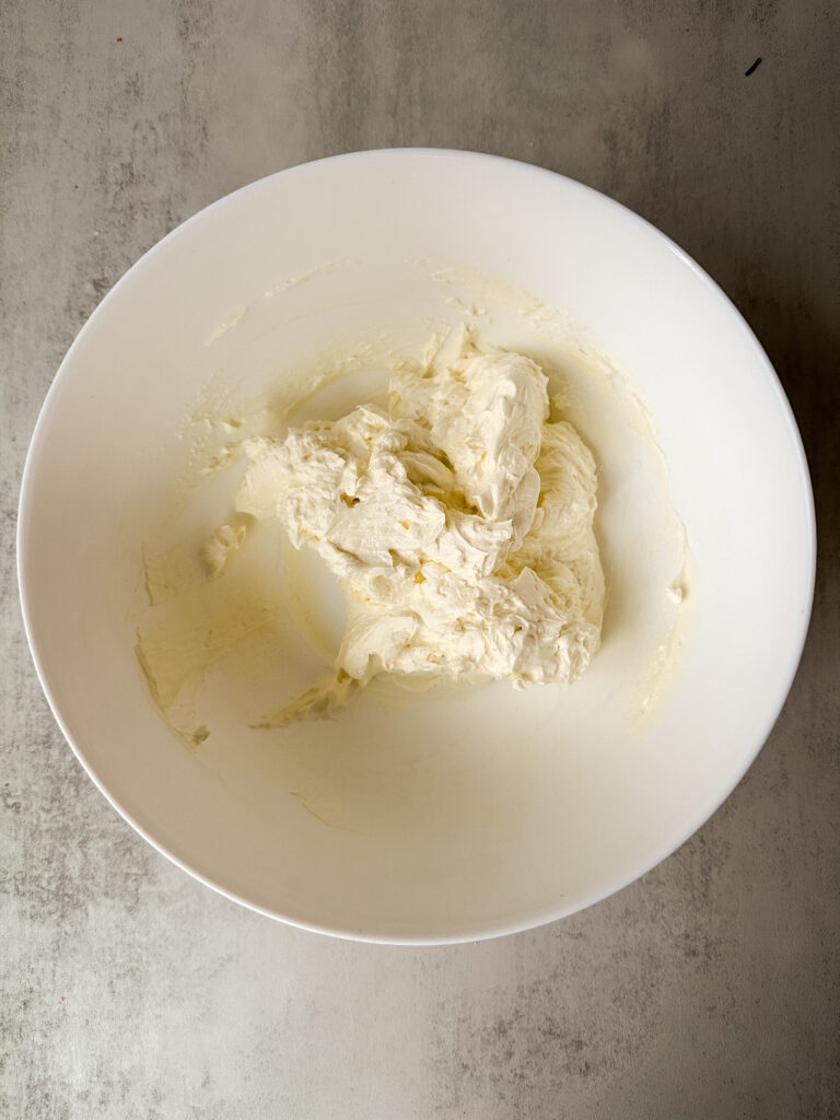 Cream the cream cheese