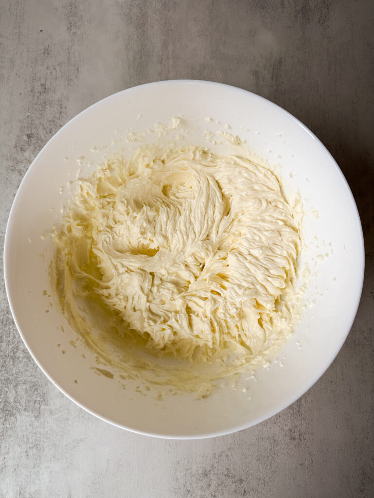 Add the sugar and flour and mix