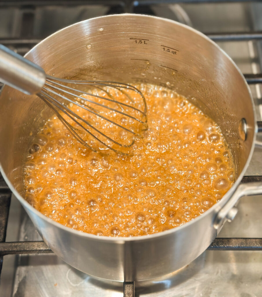 Whisk together the caramel rum sauce