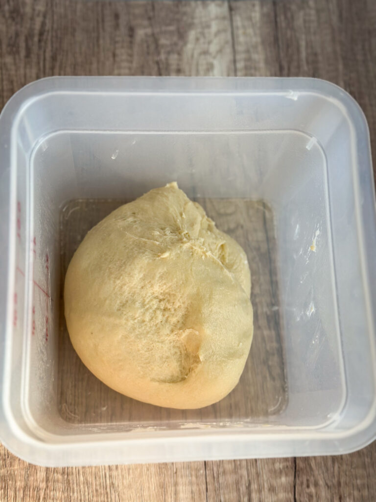 Knead and add butter until dough is smooth and tacky