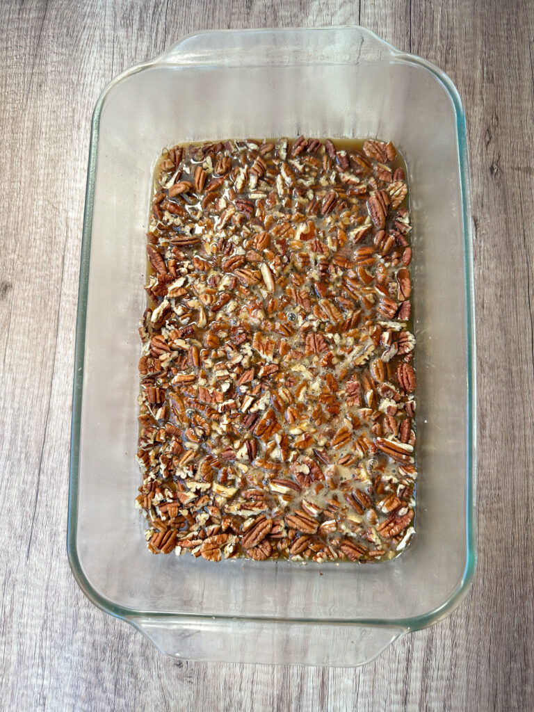 Pour over pecans in prepared pan