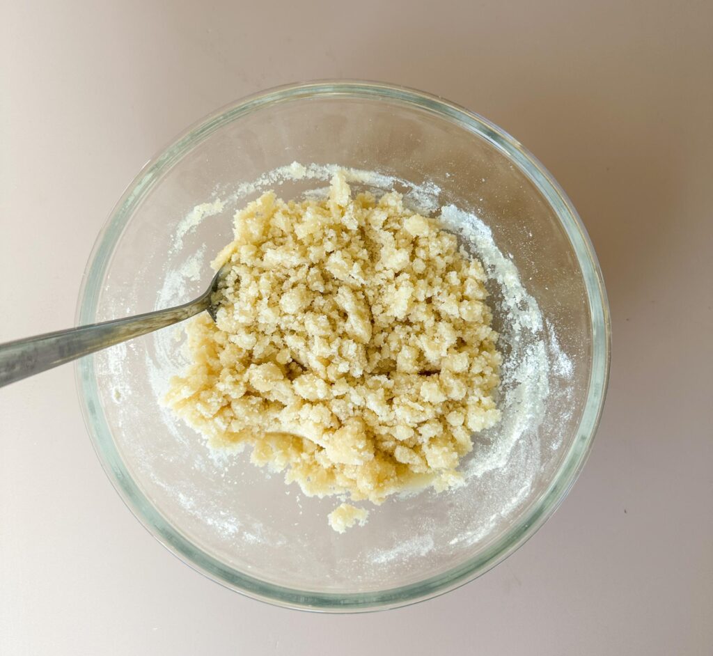 Mix crumble to top muffins