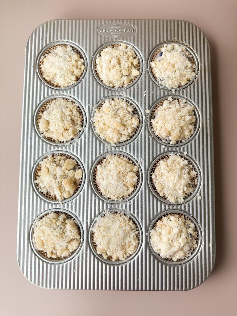 Fill muffin tin with batter and crumble