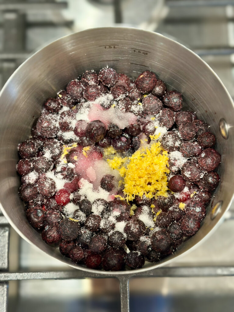 Add the blueberries, sugar, lemon juice, zest, and sal