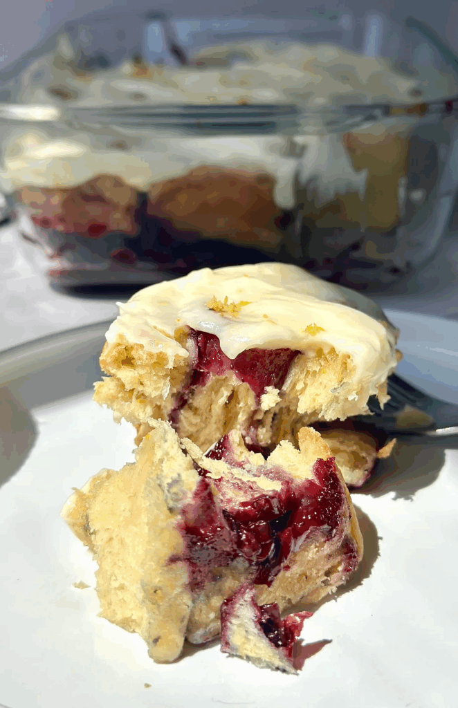 Bright, jammy, and irresistibly tender, these sourdough discard rolls bring together the tang of citrus, the burst of blueberries, and the comfort of a soft, buttery swirl—all finished with a silky lemon cream cheese glaze.