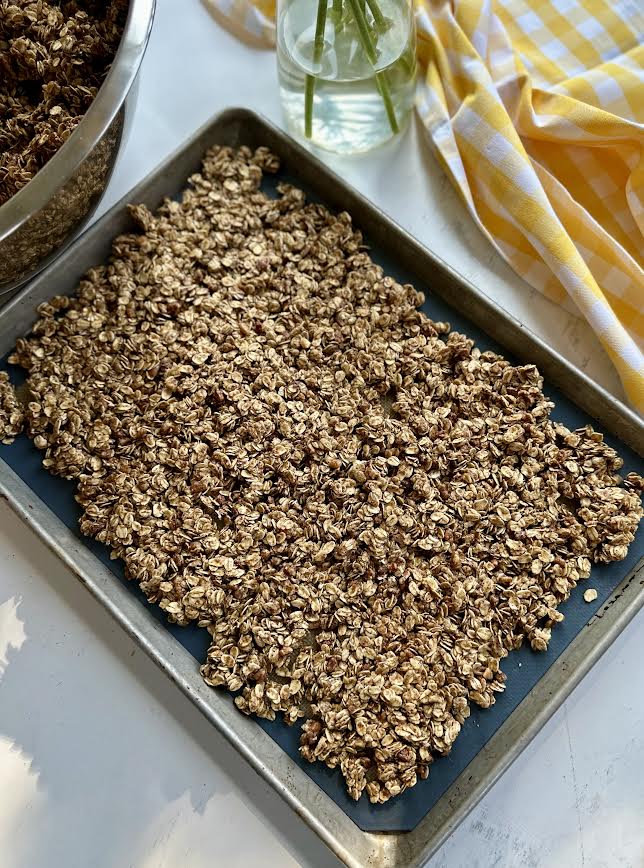 Press granola onto a baking sheet in a thin layer