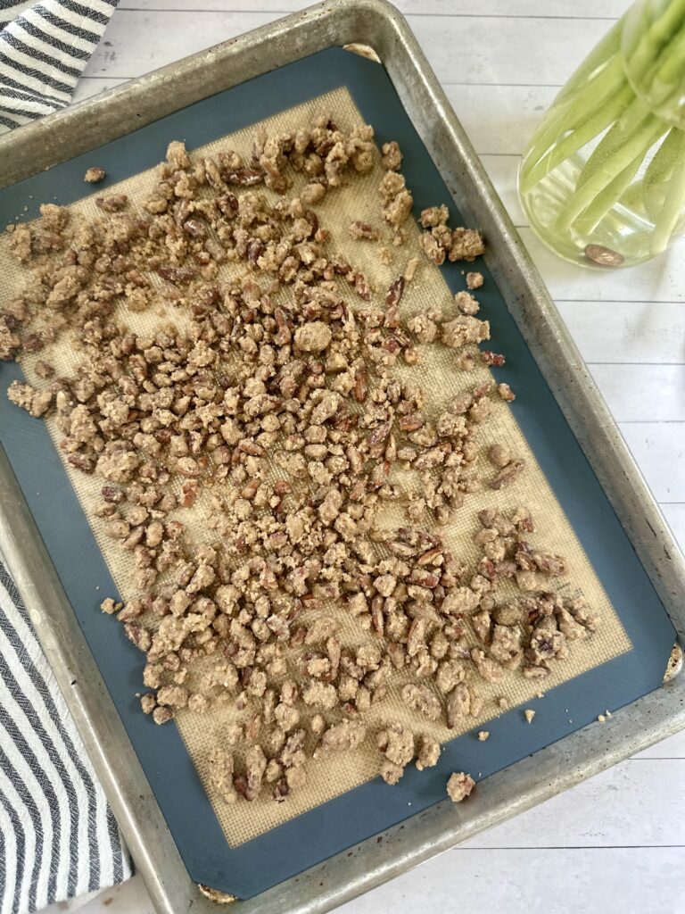 Transfer pecans to a tray for baking 