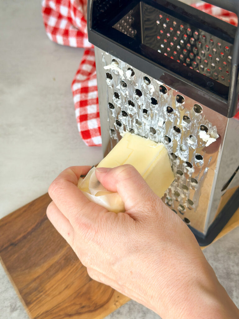 Grate your cold butter