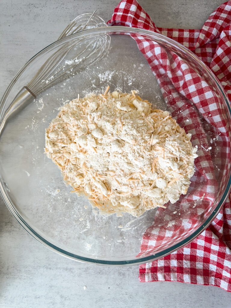 Coat the butter and cheese with dry ingredients 