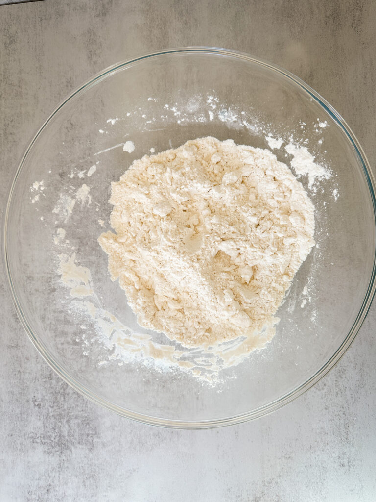 Add the grated butter and mix