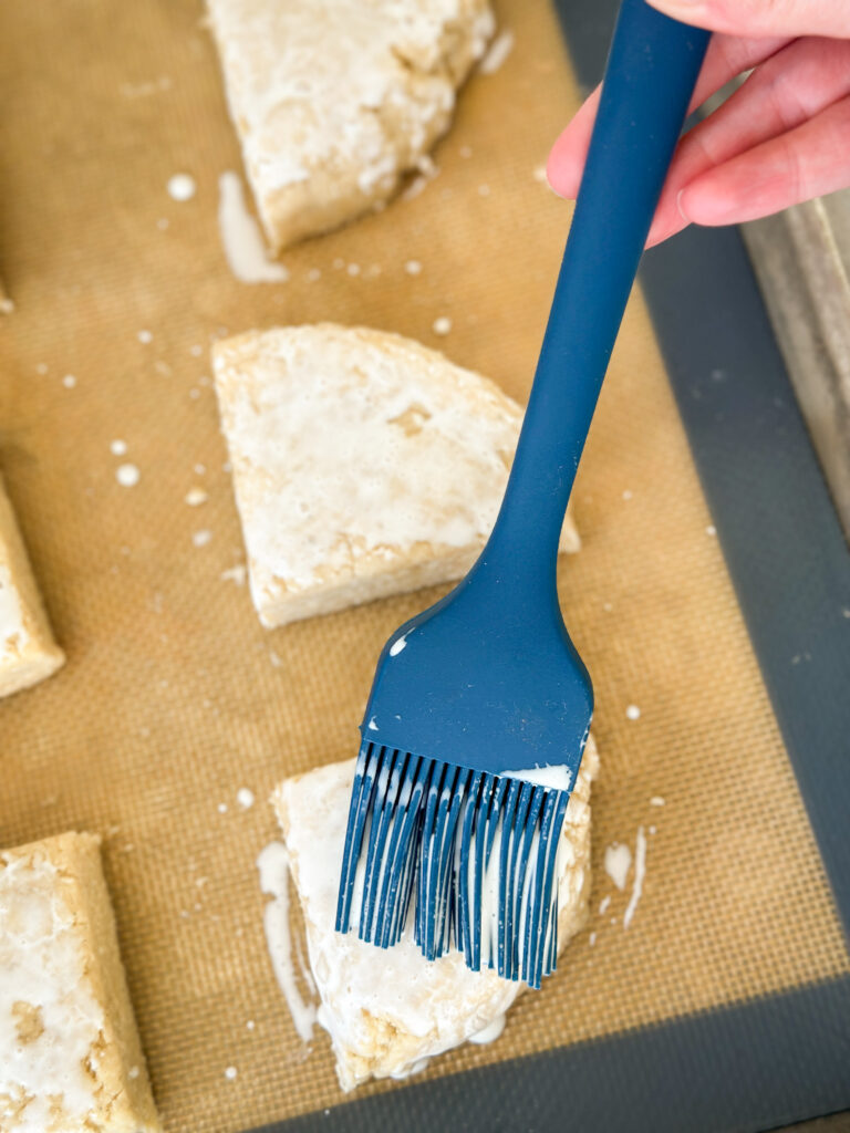 Brush the tops with heavy cream