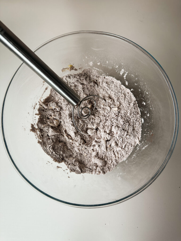 Add the grated butter and mix