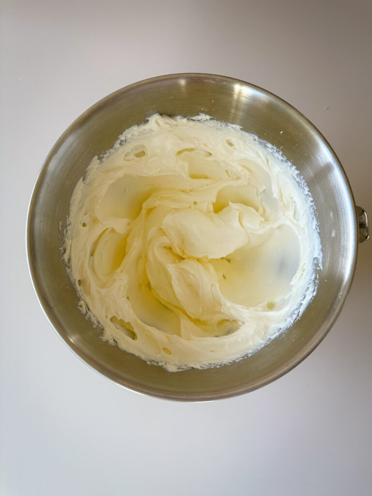 Whip butter and cream cheese