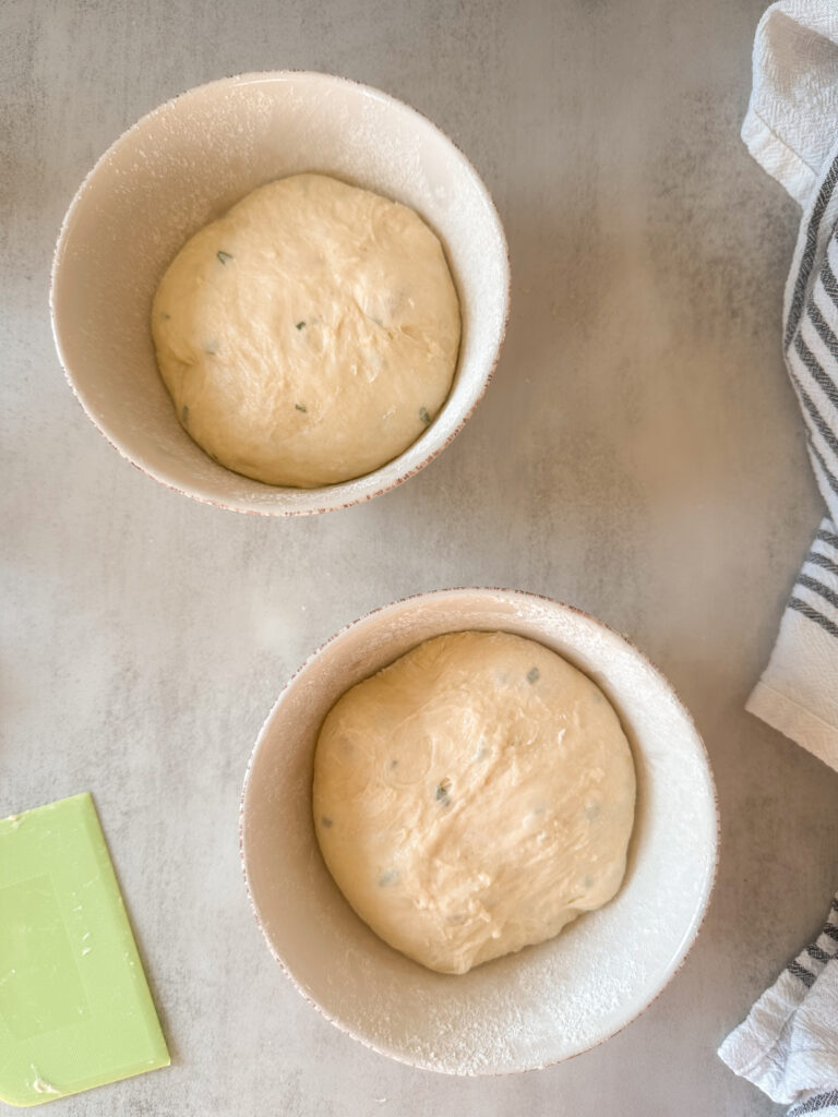 Transfer dough to prepared soup bowls and allow to proof