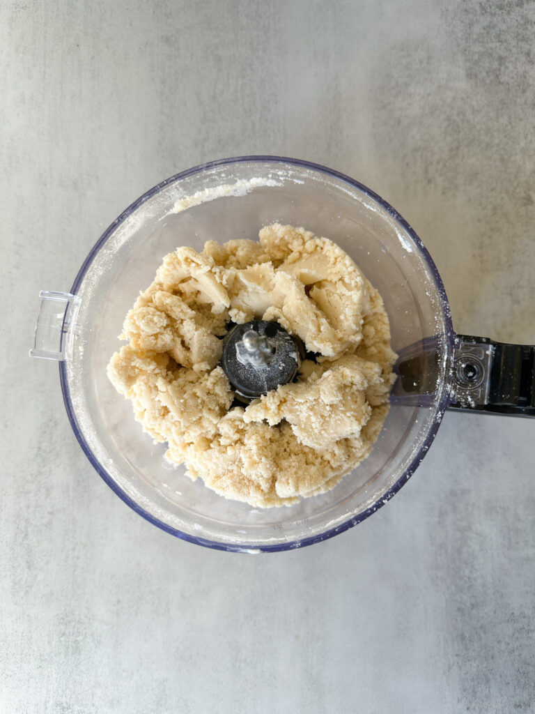 Add butter and discard and bring short bread together