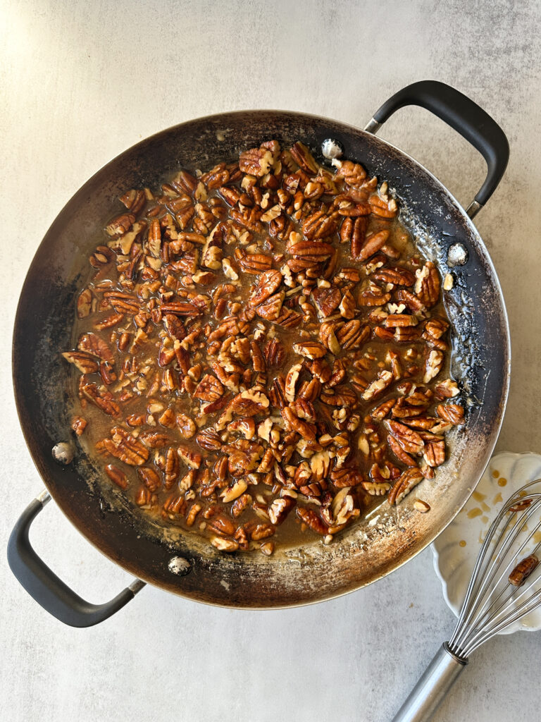 Remove from heat and add pecans and vanilla