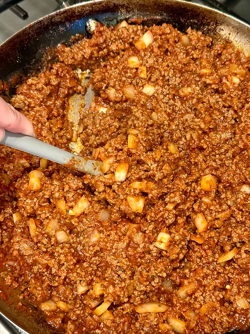 Make the rich thick red sauce.