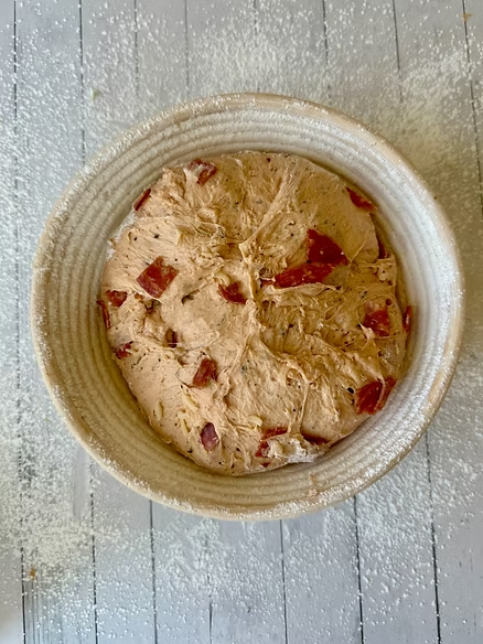 Transfer loaf to a floured bowl or banneton and refrigerate overnight