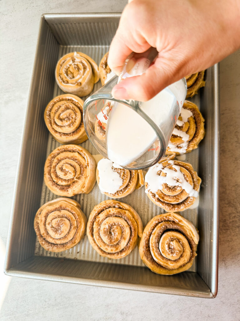 Pour cream over the rolls
