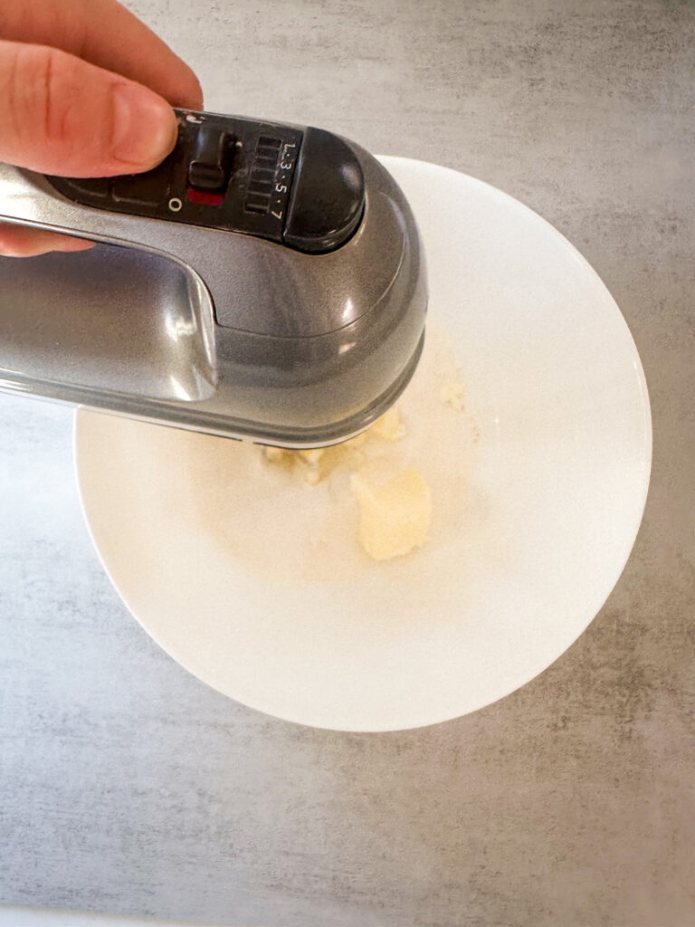 Cream together butter and sugars