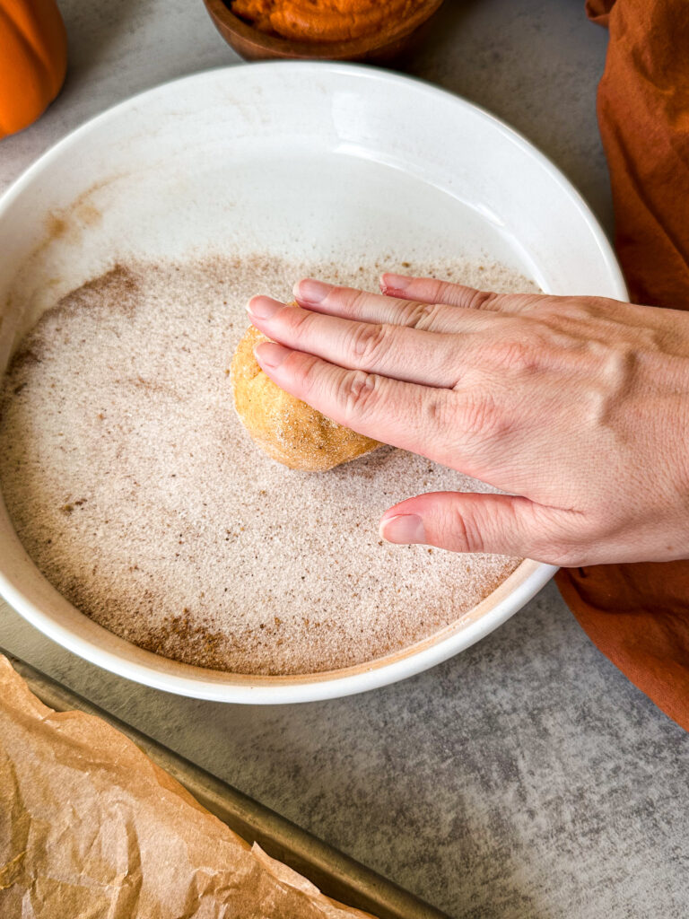 Roll cookies in sugar coating