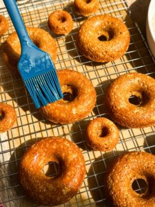 Coat both sides of the donut with butter
