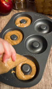 Pipe the batter into the pan filling it halfway full