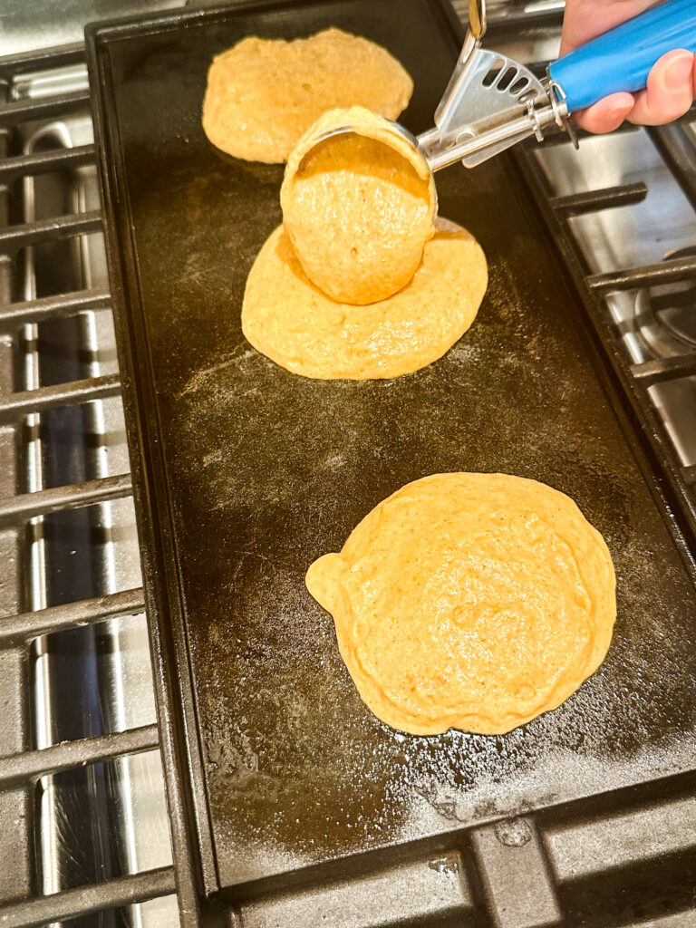 Scoop batter on to the preheated pan