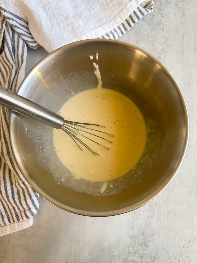 Whisk together