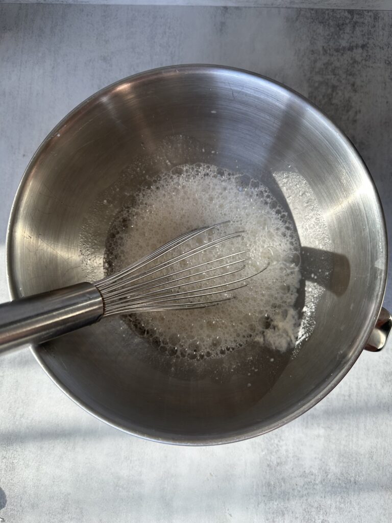 Mix starter, water, and sugar