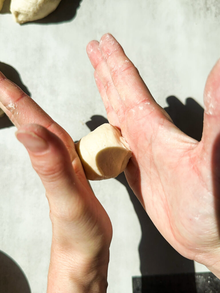 Pinch all of the edges and roll in your palms to create a smooth ball