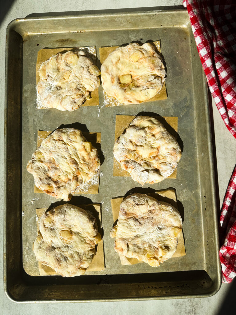 Transfer fritters to floured parchment squares to proof