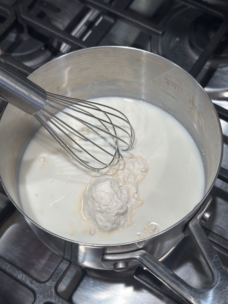 Add flour and milk to a small pot