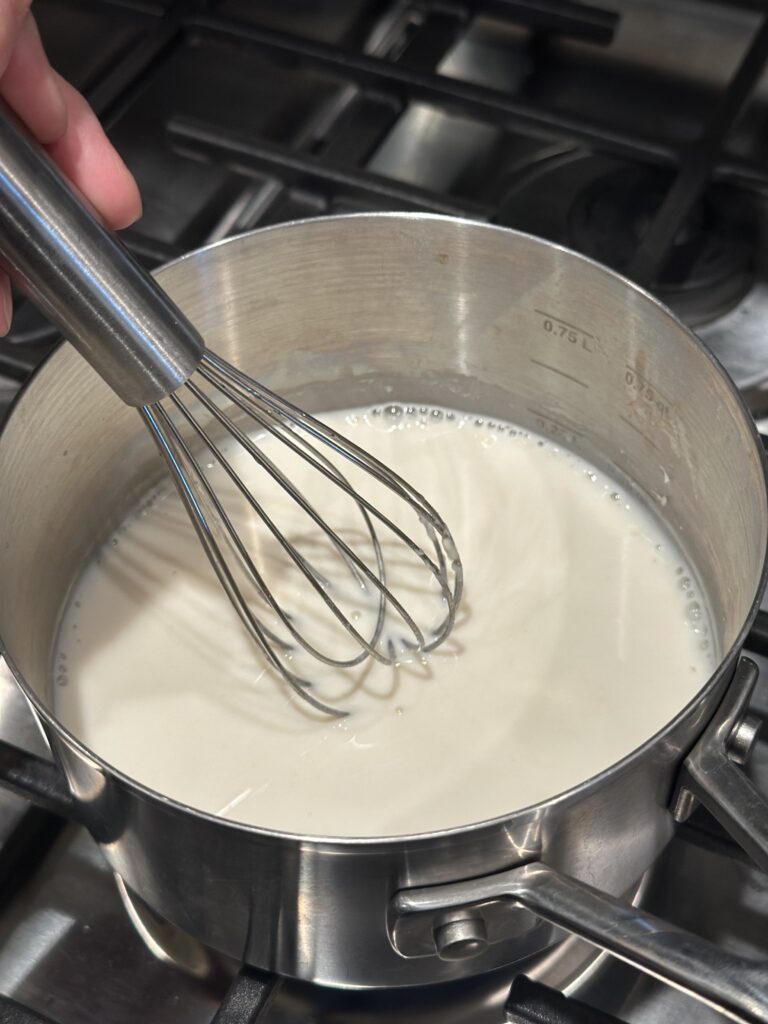 Whisk to dissolve and cook over medium/low heat