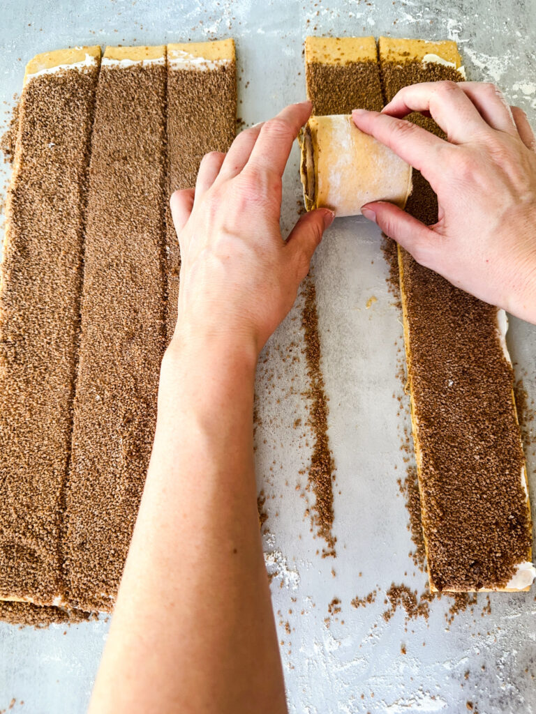 Roll up each strip starting at the bottom