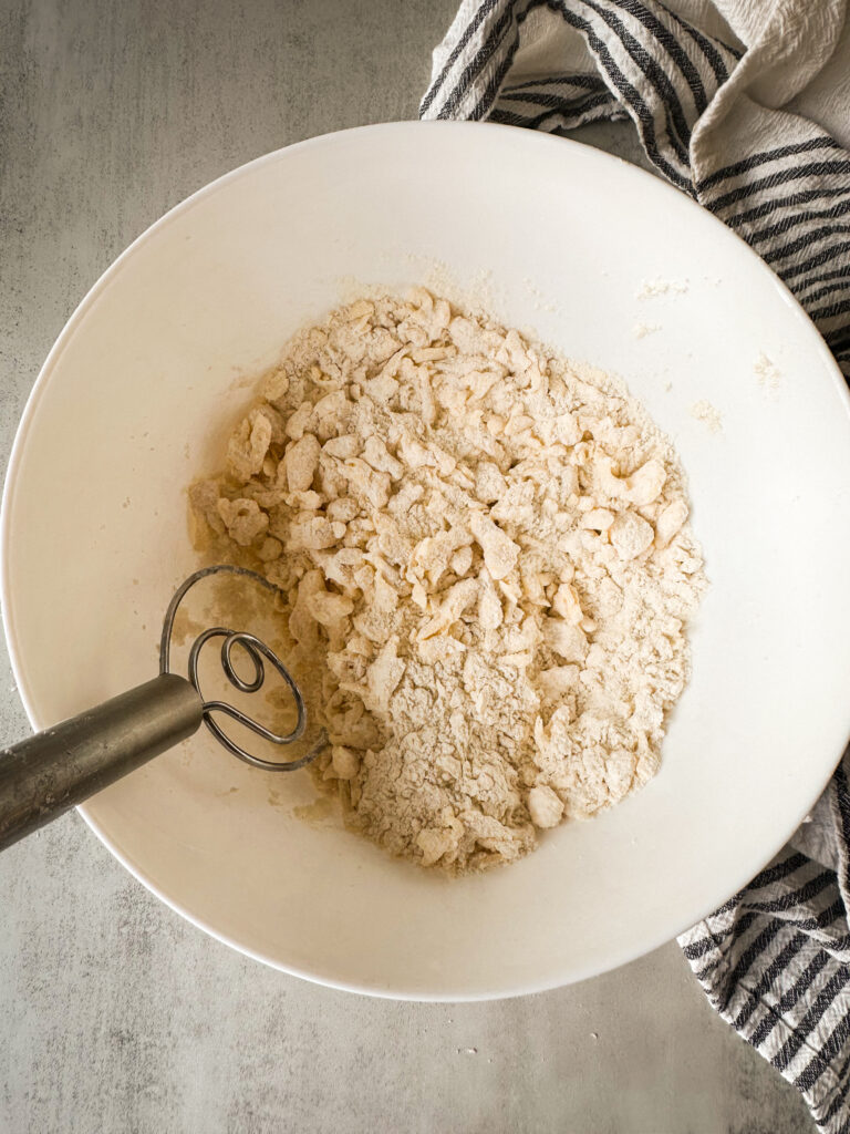 Coat butter in dry ingredients