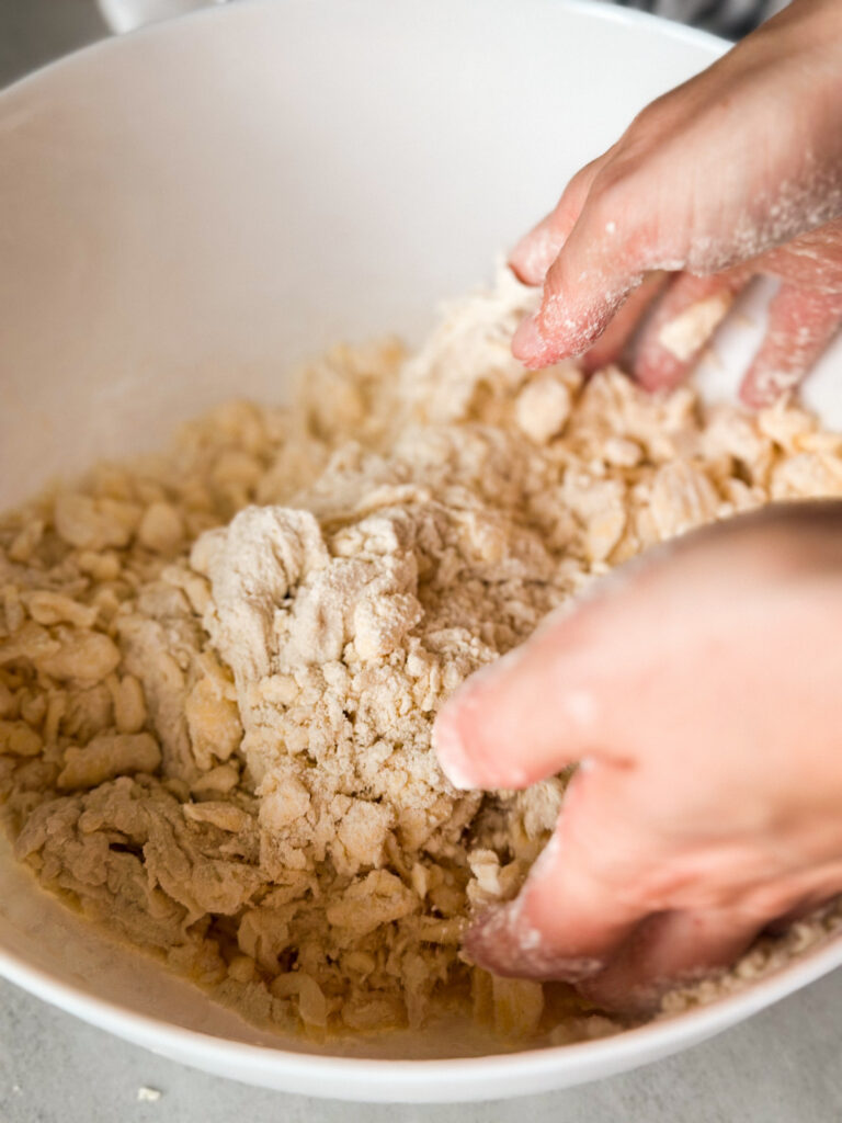 Begin to bring dough together