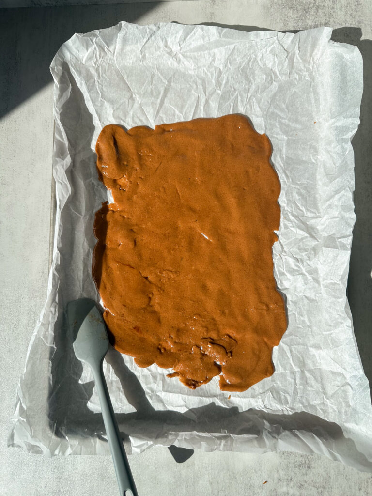 Spread hot toffee onto prepared sheet