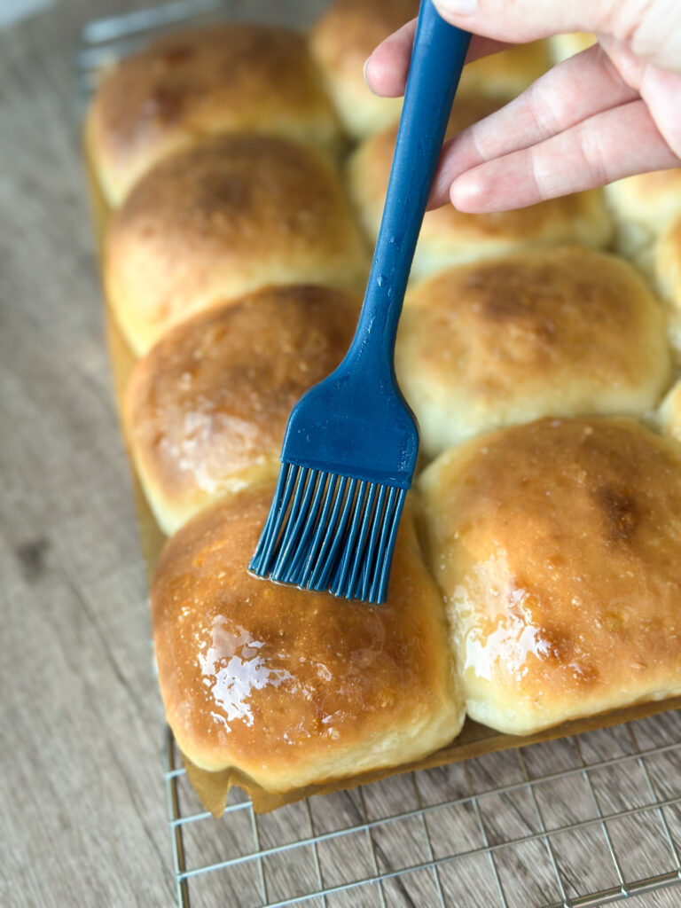Brush rolls with butter