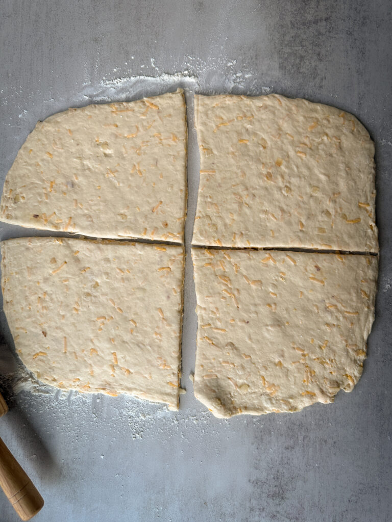 Cut dough into 4 smaller rectangles