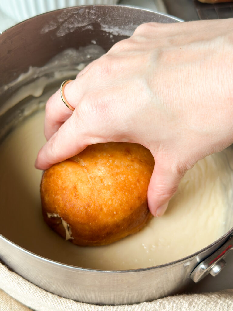 Dip donut face down in glaze