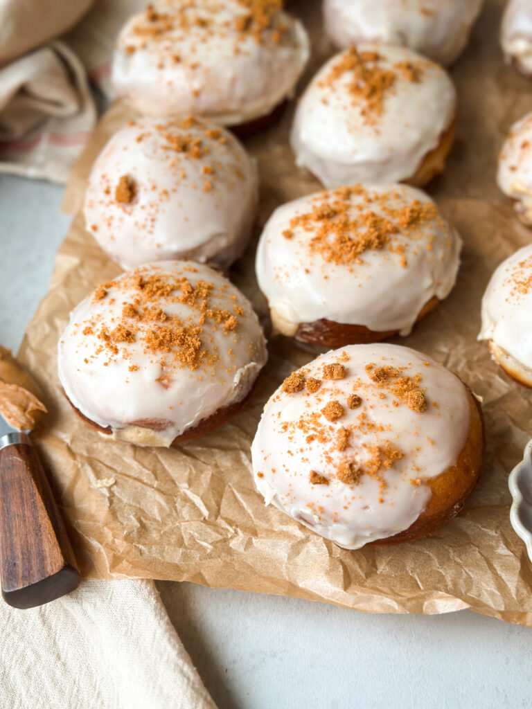 Top donuts with crushed cookie crumbles