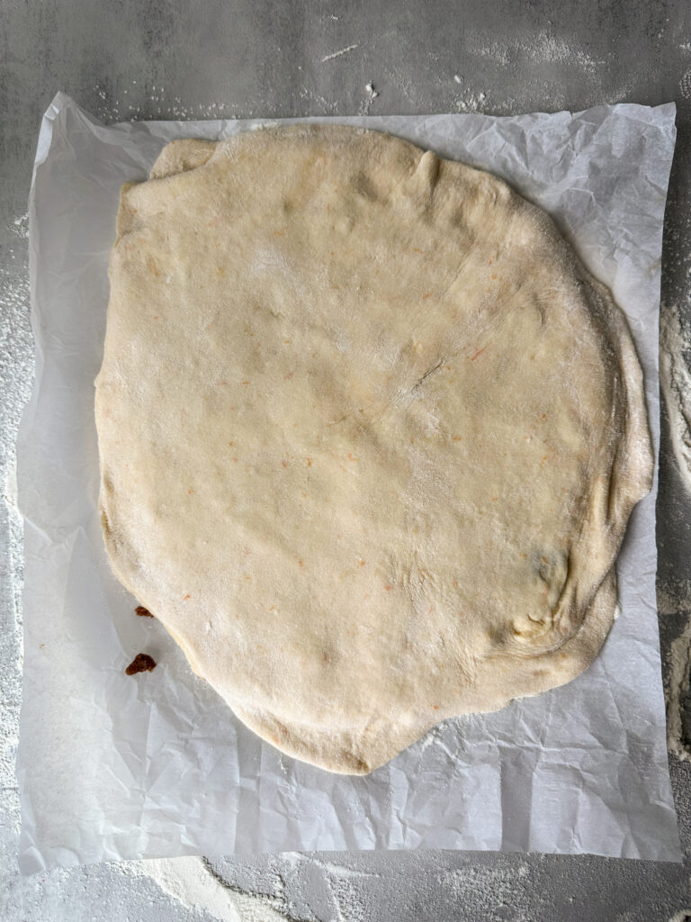 Repeat that step with the 2nd dough ball and the rest of the cinnamon sugar then top with final layer of dough