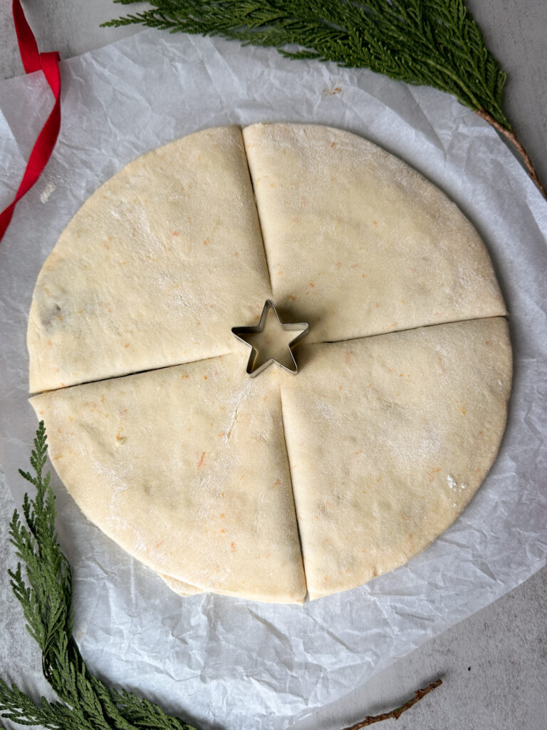 Cut dough in quarters