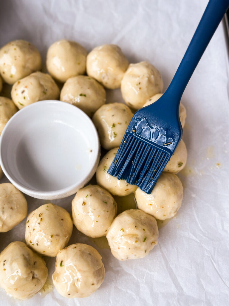 Brush wreath with garlic butter