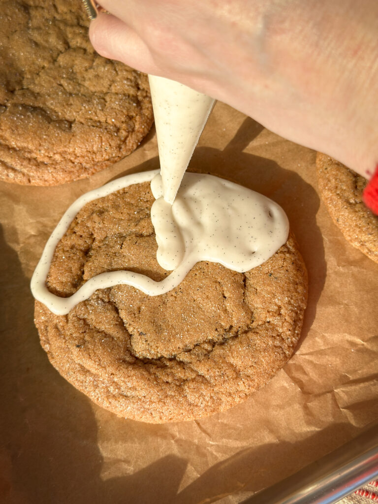 Pipe the icing on half of the cookies