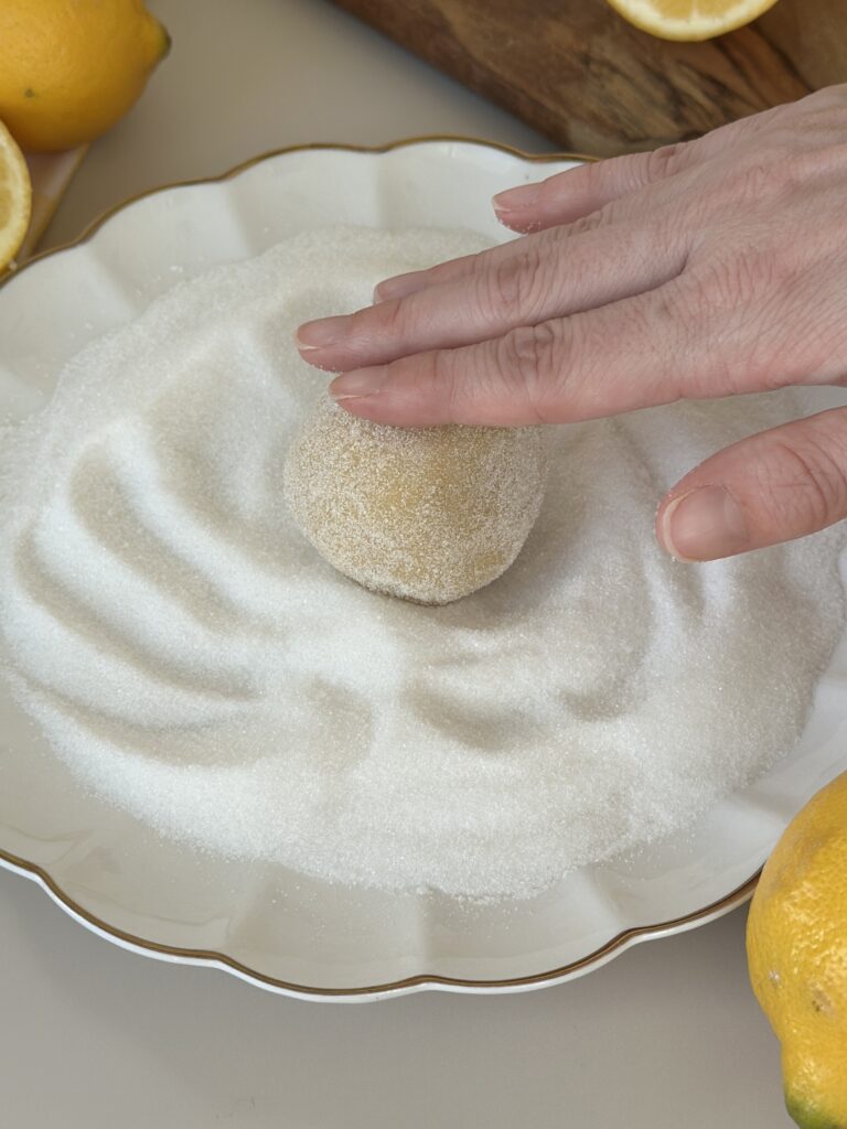 Coat cookies in granulated sugar