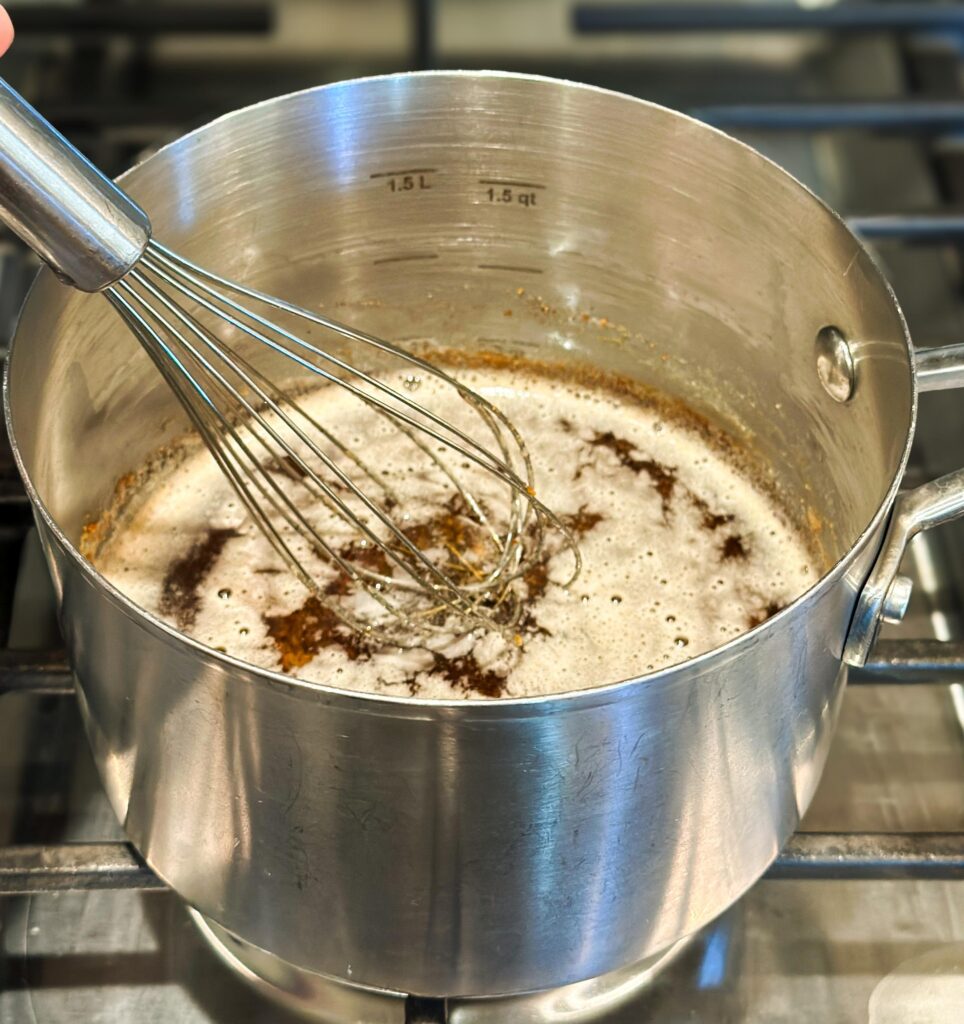 Cook until it starts to foam and is a rich amber color