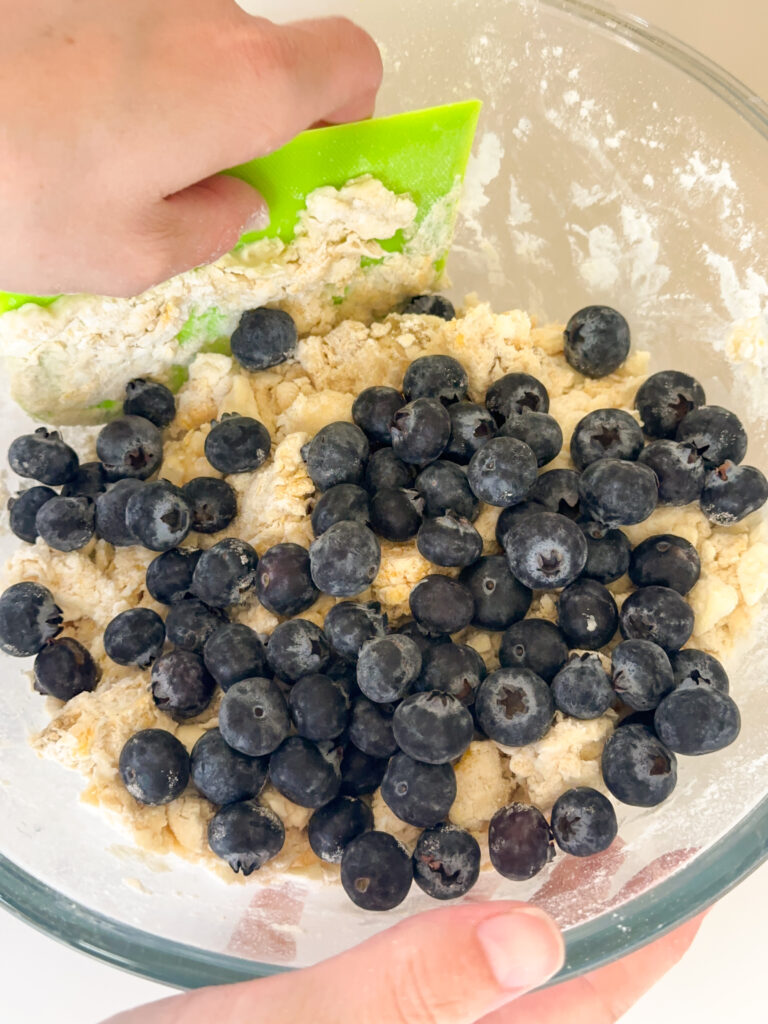 Add blueberries to the dough