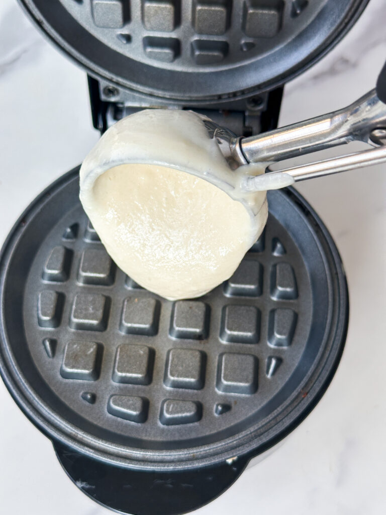 Scoop the batter onto the iron